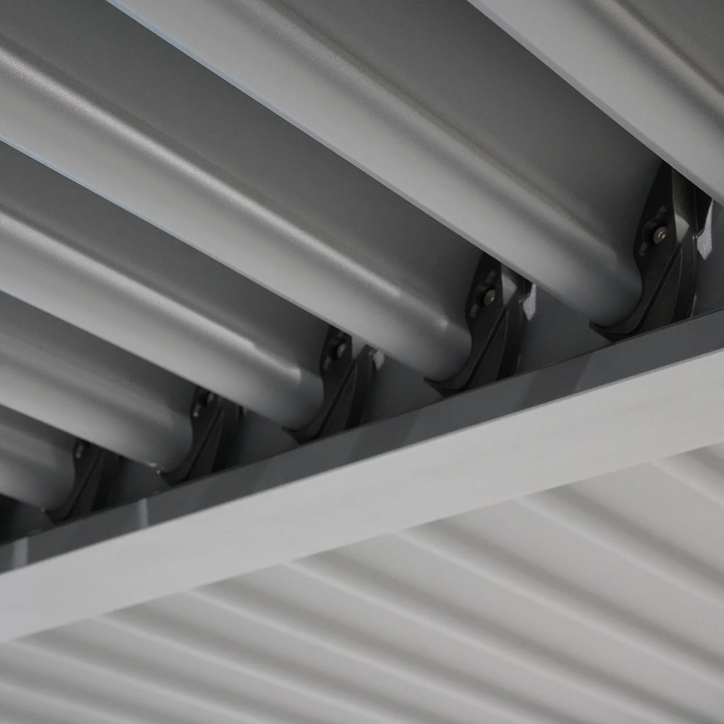 Pergola bioclimatique autoportante aluminium et acier gris 4 x 3 m toit incliné